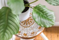 From Keys to Green: Piano Stool Plant Perch