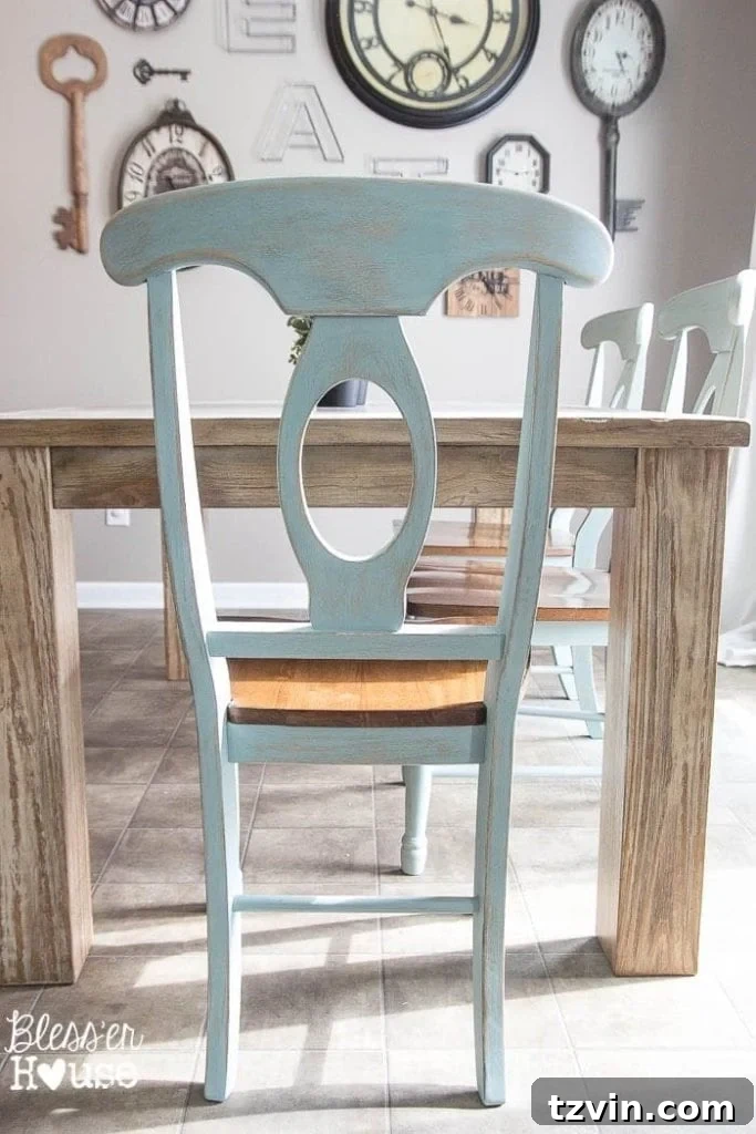 Final reveal of a beautifully distressed duck egg blue dining chair, ready for everyday use in a family home.