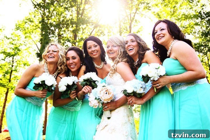 Bride and bridesmaids in duck egg blue dresses, showcasing the color's personal significance and aesthetic appeal.