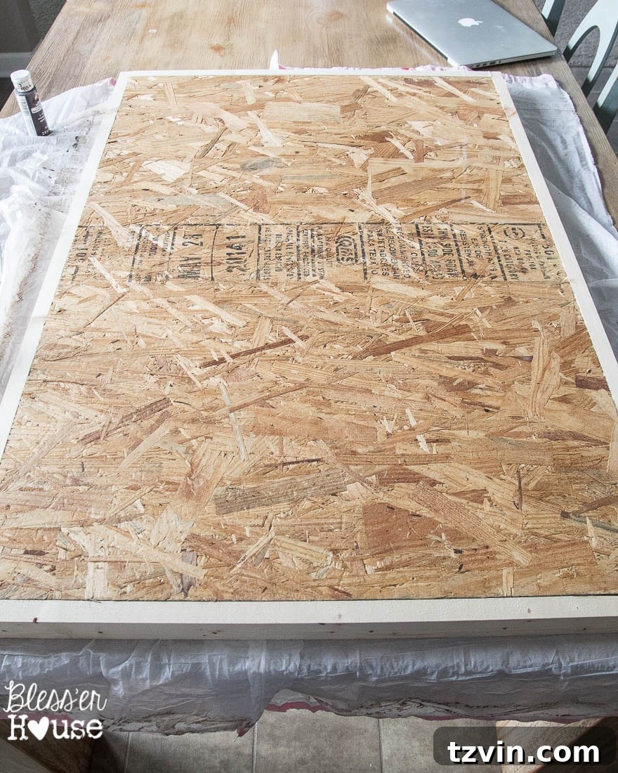 DIY Giant Sheet Music Wall Art 12 Unstained wood frame of the oversized sheet music sign.