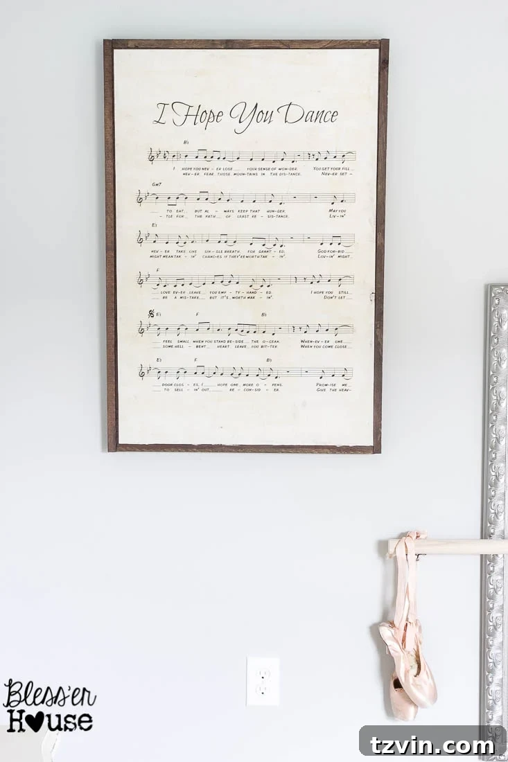 DIY Giant Sheet Music Wall Art 22 Close-up of the finished sign, highlighting the antique texture of the paper and frame.