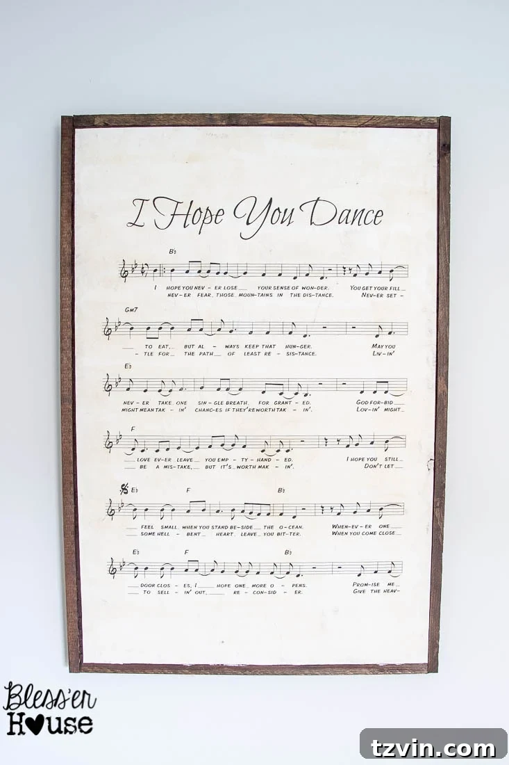 DIY Giant Sheet Music Wall Art 27 The large, custom sheet music sign adorning the wall of a child's room.