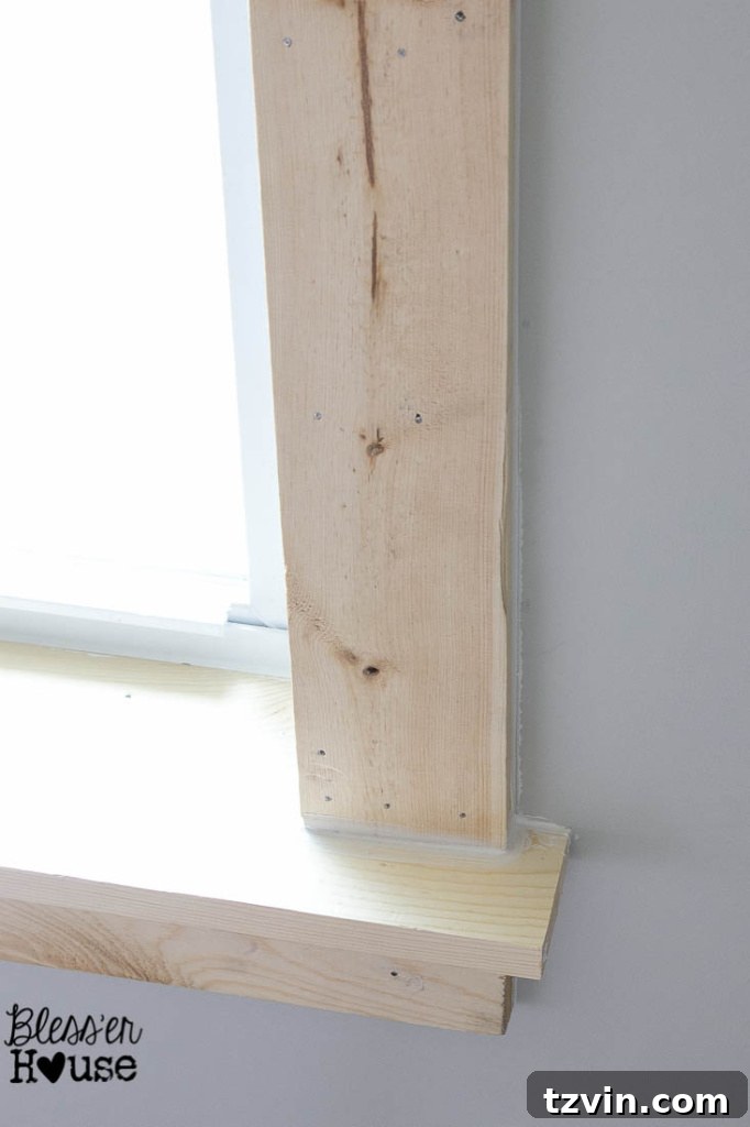 add caulk to hide gaps around interior window casing