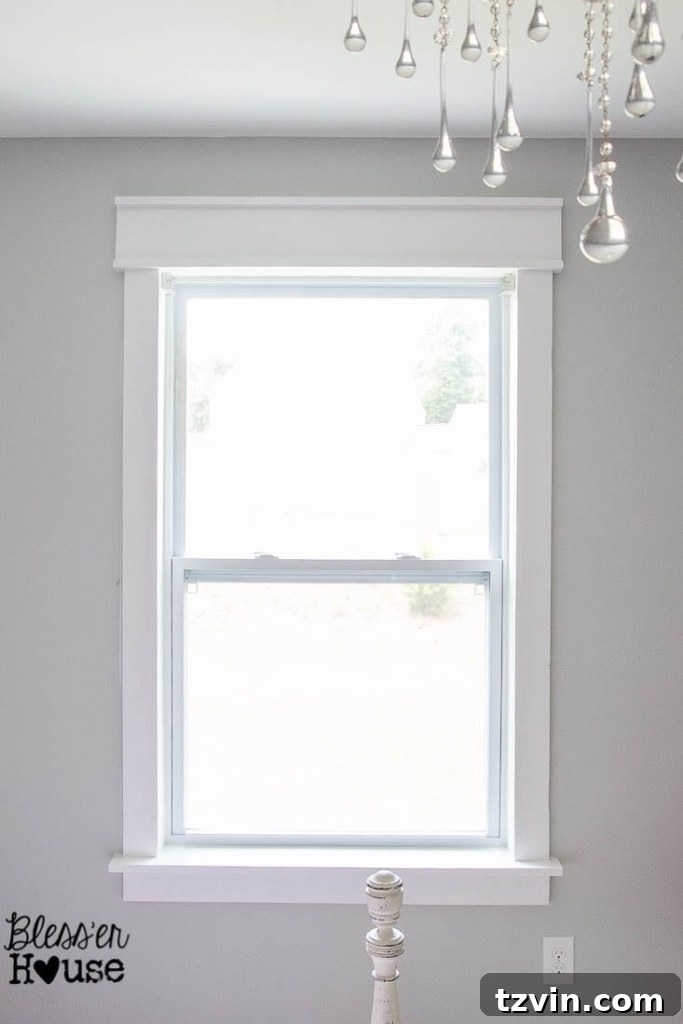 finished interior window trim painted and caulked using basic lumber with no miter cuts