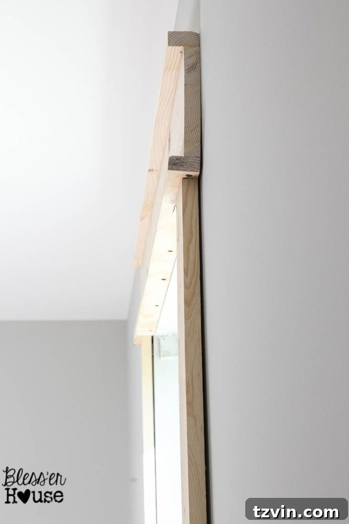 side view of DIY window trim before adding caulk - gaps happen and can be fixed