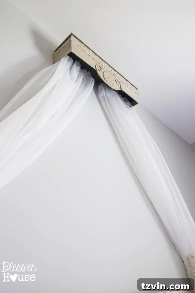 Upcycled Shelf Canopy Crown Project 5 Easy 15-Minute DIY Canopy Project - Sheer curtains on a tension rod.