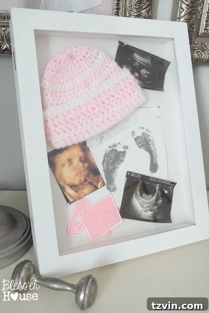 Our Prima Ballerina's Dream Bedroom Transformation 19 Shadowbox with baby mementos and vintage silver rattle on dresser