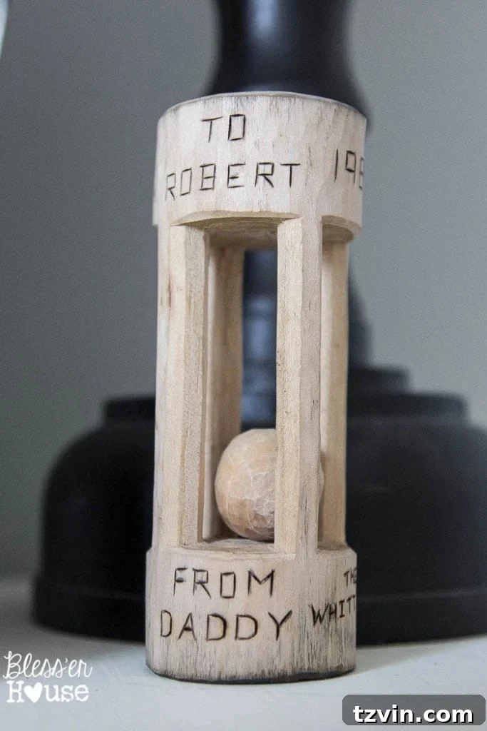 Our Prima Ballerina's Dream Bedroom Transformation 21 Hand-whittled wooden rattle by grandfather on child's dresser