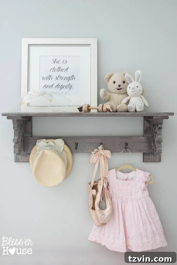 Our Prima Ballerina's Dream Bedroom Transformation 23 Shelf with Bible verse, antique toys, and handcrafted bird rattle