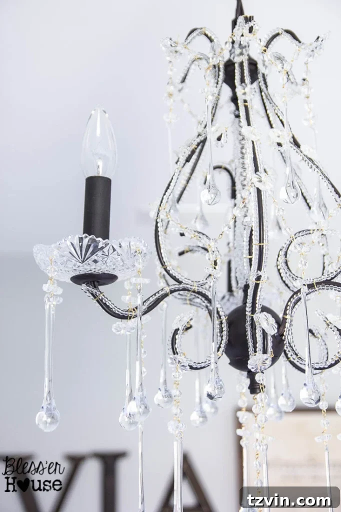 Our Prima Ballerina's Dream Bedroom Transformation 33 Elegant chandelier replacing old light fixture in girl's ballerina room