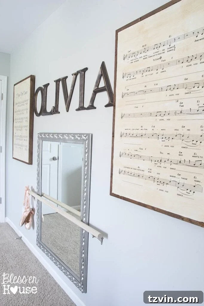 Our Prima Ballerina's Dream Bedroom Transformation 8 DIY oversized sheet music signs with ballet barre and mirror