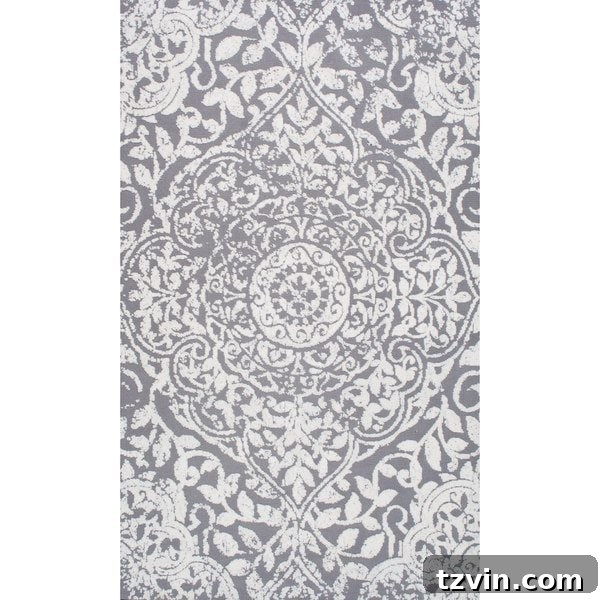 12 Greige Rugs That Look Expensive But Aren't 11 NuLOOM Modern Vintage Fancy Floral Grey Rug: A beautiful greige rug blending modern and vintage aesthetics with an intricate floral pattern, bringing a soft, artistic touch to your home. Its distressed look adds character and timeless charm.