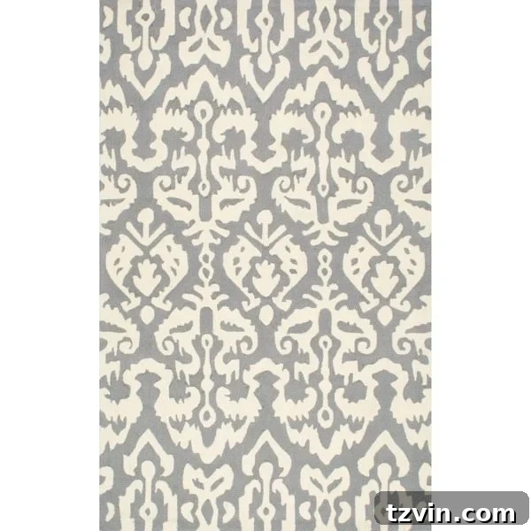 12 Greige Rugs That Look Expensive But Aren't 17 NuLOOM Handmade Southwestern Tribal Fancy Rug: A unique greige rug with a distinctive Southwestern tribal design, perfect for adding an eclectic and artistic touch to modern and bohemian interiors. Its handmade quality ensures unique appeal.