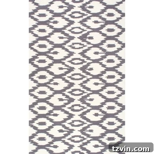12 Greige Rugs That Look Expensive But Aren't 9 NuLOOM Handmade Modern Ikat Trellis Grey Rug: This contemporary greige rug features a striking ikat trellis pattern in grey, adding a touch of global flair and geometric interest to your floors. Its hand-woven craftsmanship ensures unique character for modern interiors.