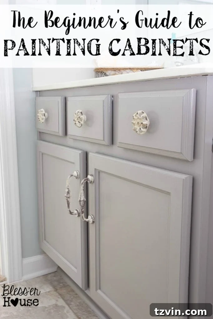 Beautifully painted bathroom cabinets in a light neutral color, showcasing a professional finish