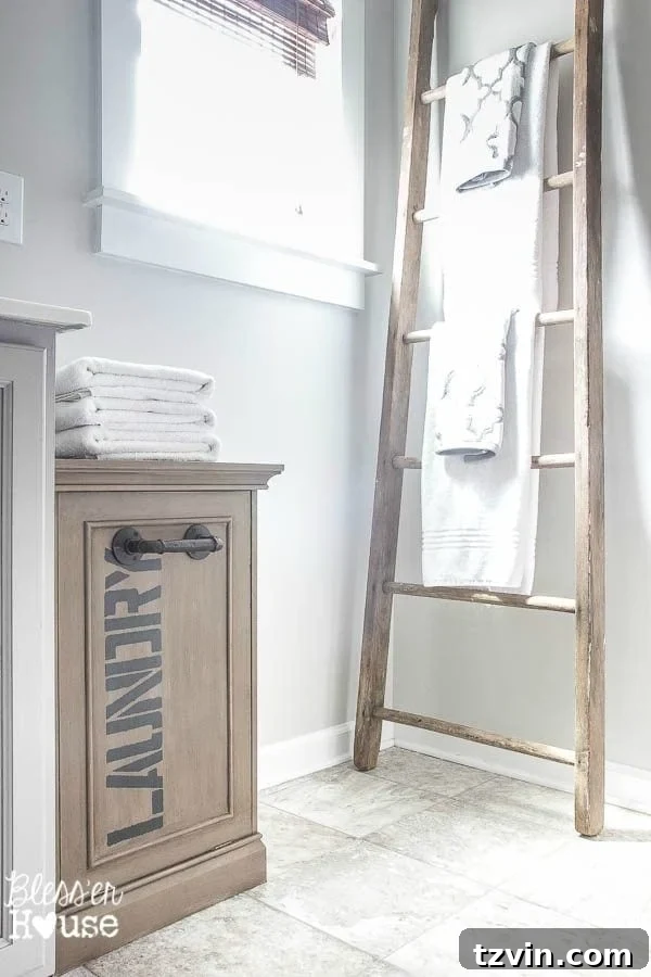 Industrial Hamper Reimagined 11 Industrial laundry hamper complementing rustic ladder towel rack