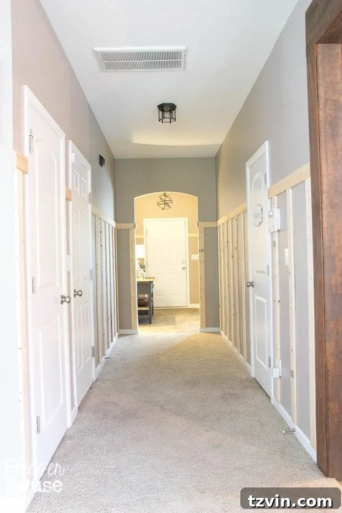 Plain board and batten in a hallway without a shelf