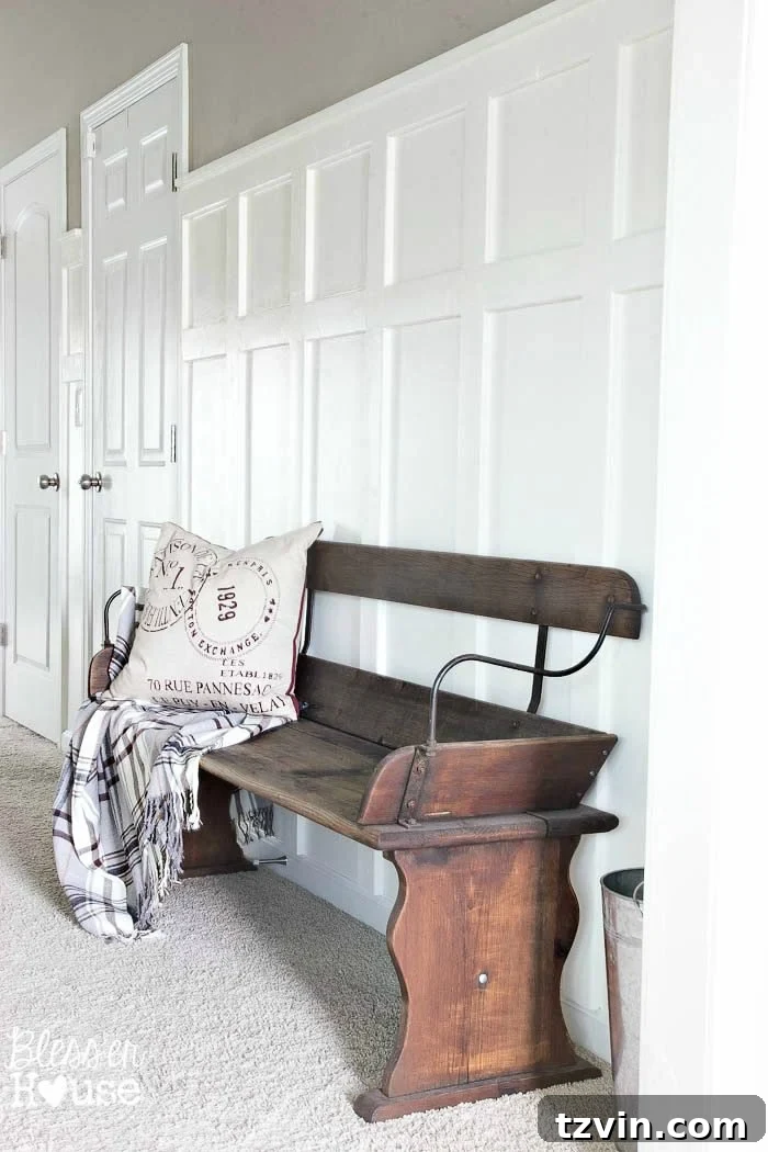 Finished board and batten wainscoting in an entryway
