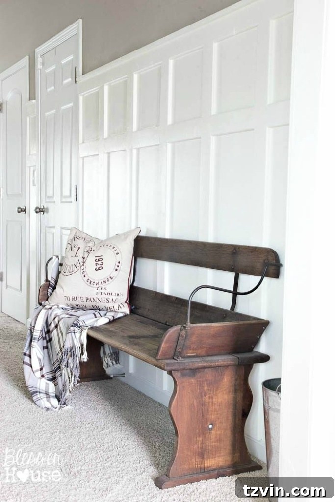 Restored wagon bench against new DIY board and batten wall.