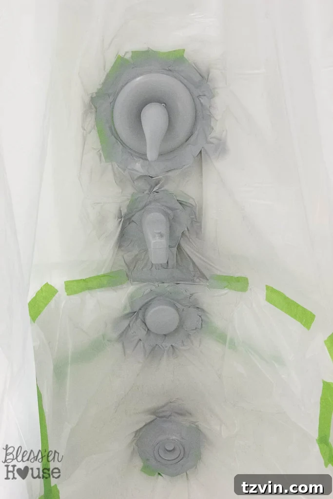 Revamp Your Bathroom Fixtures with Spray Paint 12 spray painted shower fixtures