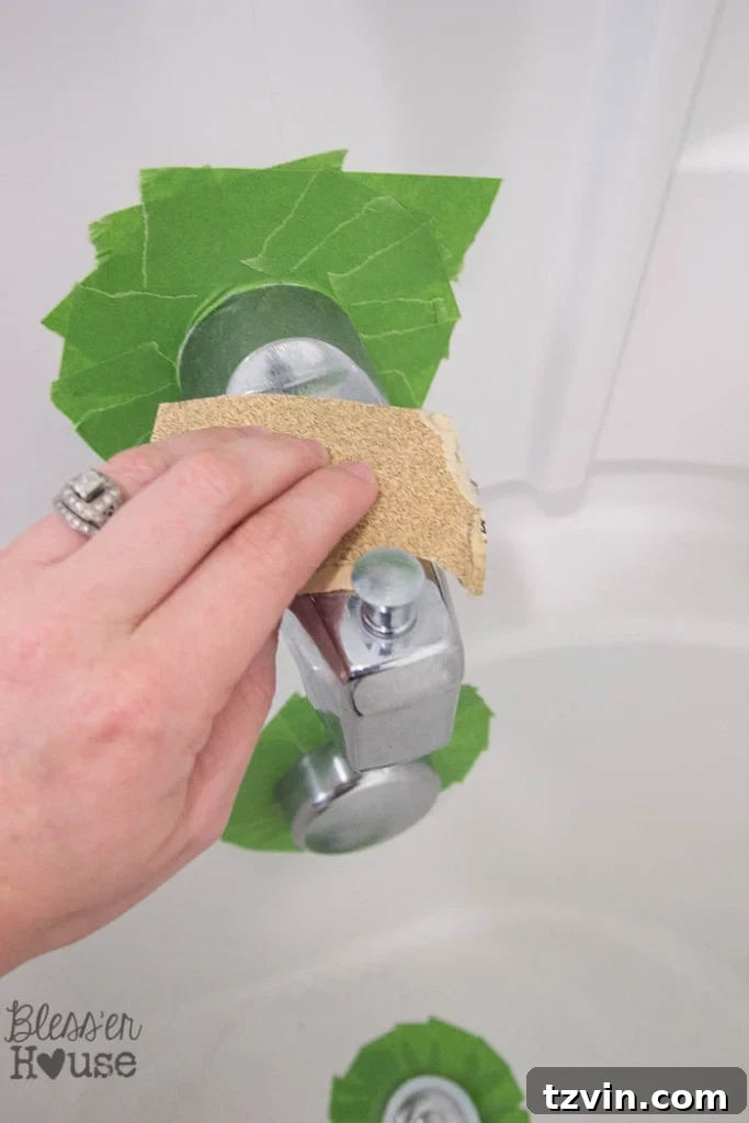 Revamp Your Bathroom Fixtures with Spray Paint 5 sanding chrome finish to spray paint shower fixtures
