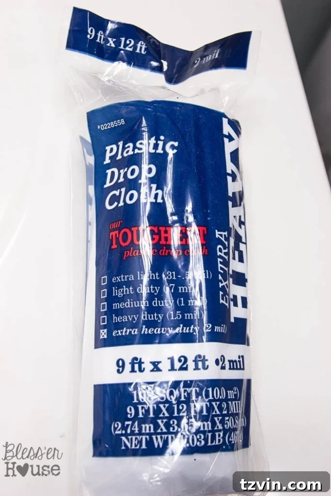Revamp Your Bathroom Fixtures with Spray Paint 8 plastic drop cloth for spray painting shower fixtures