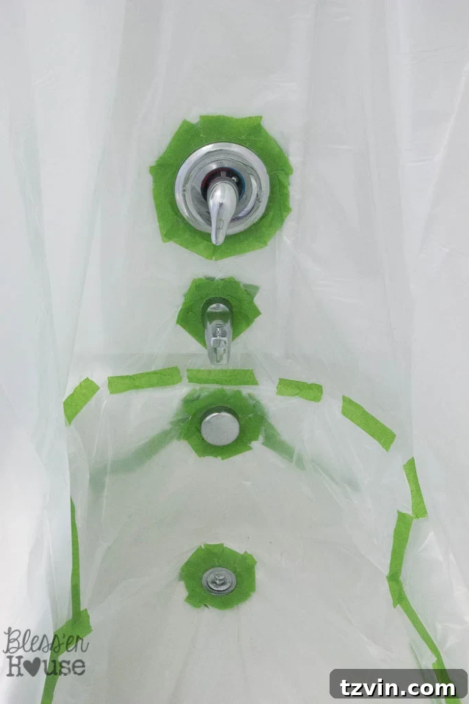 Revamp Your Bathroom Fixtures with Spray Paint 9 taped drop cloth to spray paint shower fixtures