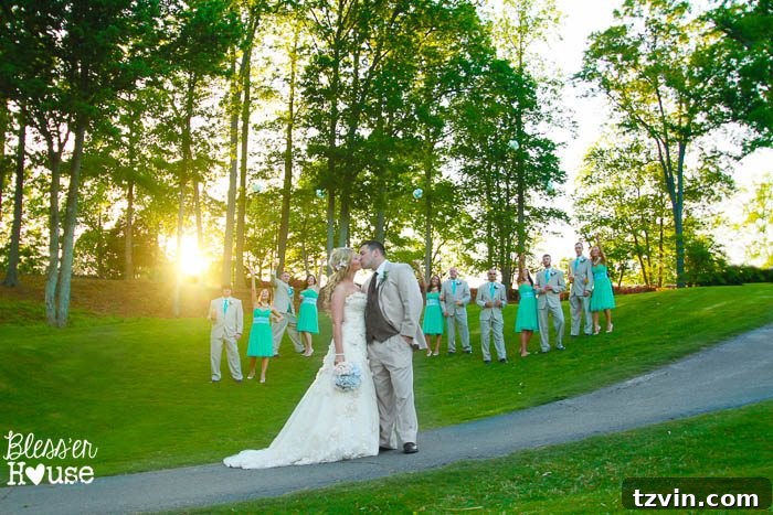 Lakeside Love Story: From Then to Forever 38 Bride and groom with bridal party