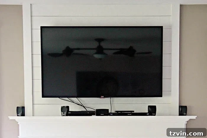 Concealing Tech on a Mantel 3 Before: TV Cords and Electronics Visible on the Mantel
