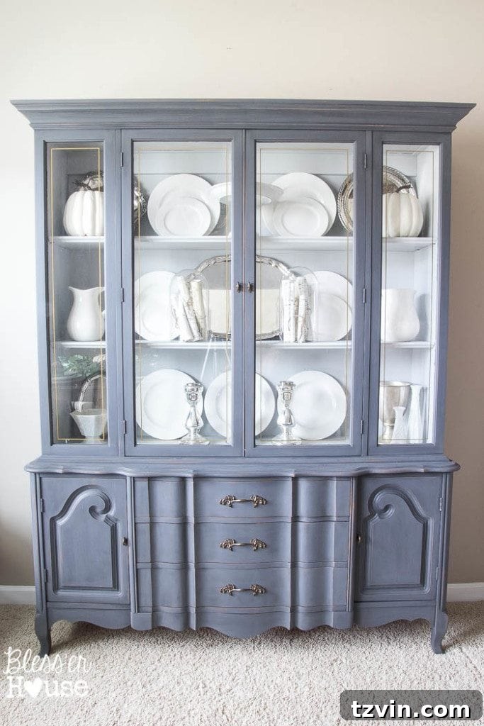 French Provincial Hutch Reimagined 10 French Provincial China Cabinet Makeover: Elegant display of white china and family silver, close-up