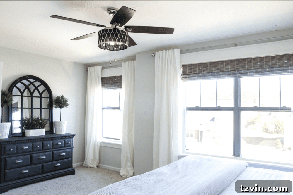 3 Smart Ways to Elevate Basic Windows 8 Master Bedroom Featuring a Stylish, Modern Ceiling Fan