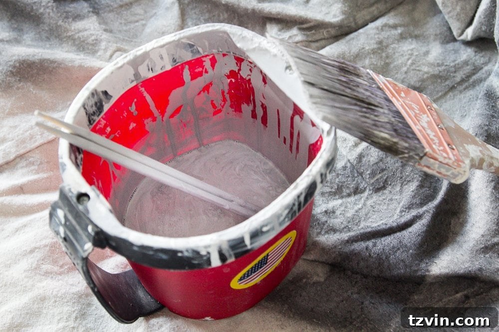 Revitalize Your Sofa: Easy Upholstery Painting 5 Mixing chalk paint with water for fabric upholstery painting