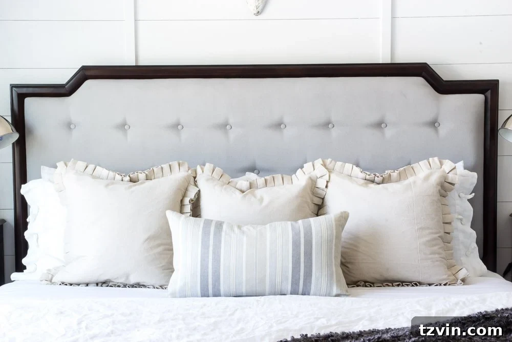 Revitalize Your Sofa: Easy Upholstery Painting 10 Finished upholstered headboard painted with Paris Grey chalk paint