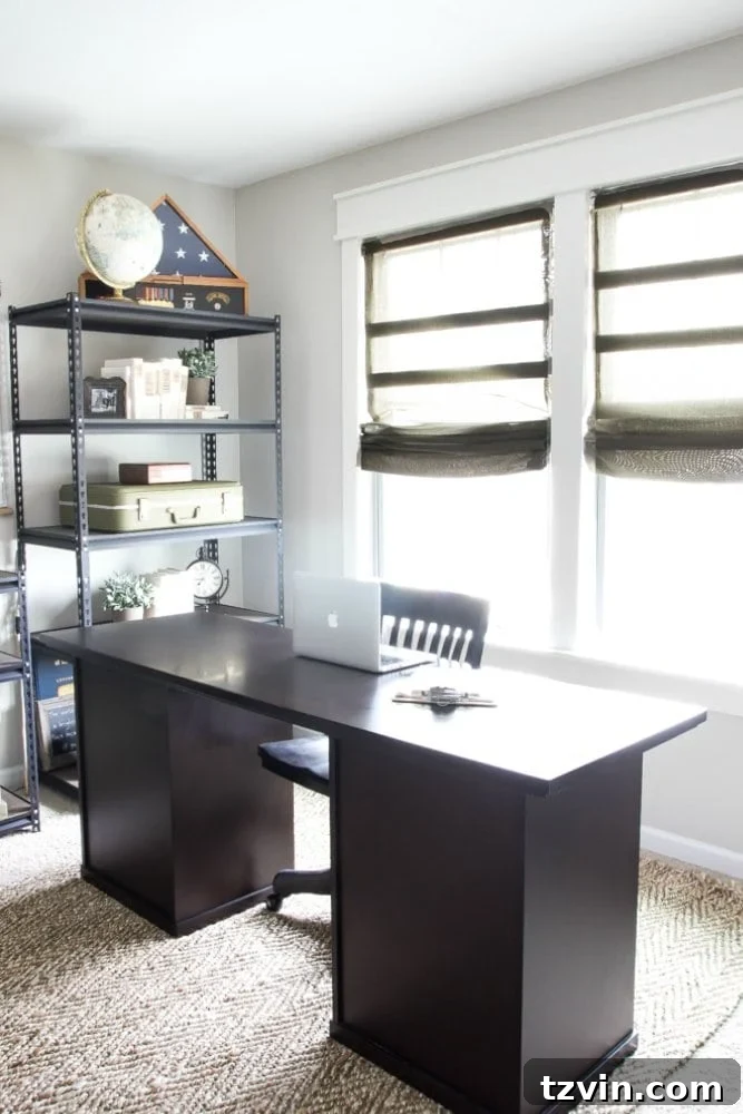 Finished DIY burlap Roman shades installed in the renovated office, adding warmth and style