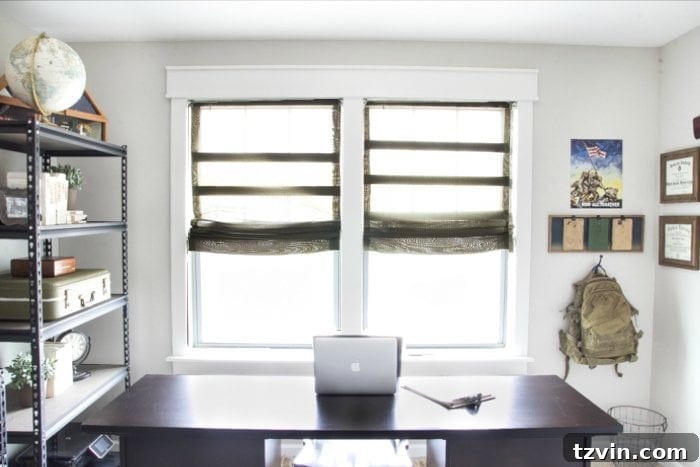 View of the newly installed DIY Roman shades and window trim in the almost complete office