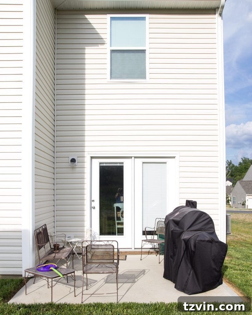 How to Decorate a Small Patio | blesserhouse.com - Utilize a small patio space with chairs at each corner and a fire pit in the middle for function and entertainment. Add string lights for a cozy ambience.