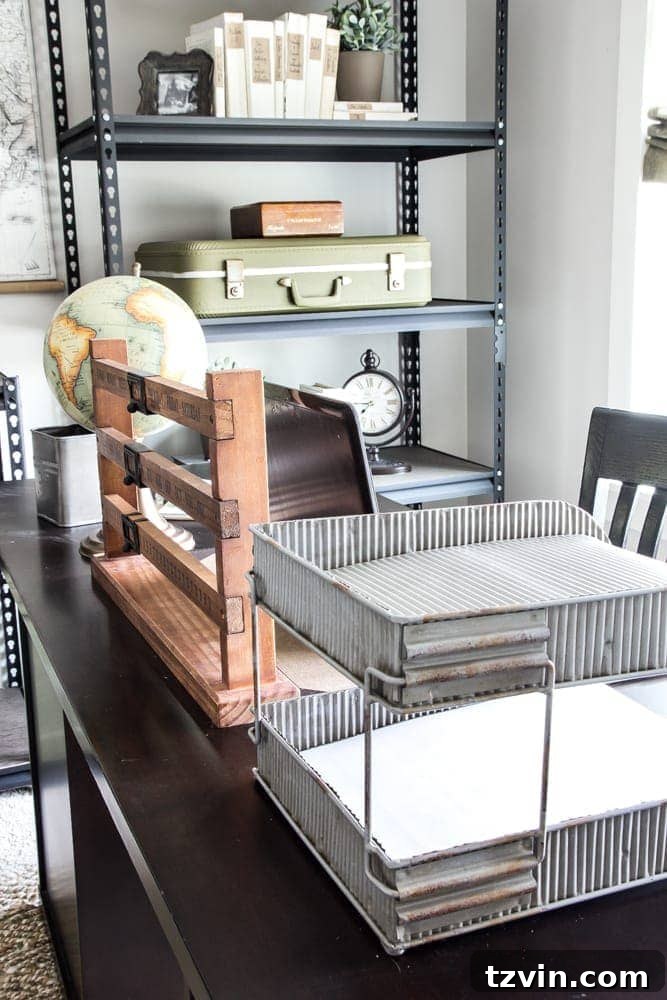 Robert's Organized Desk in Industrial Military Office | blesserhouse.com - Featuring a vintage-inspired desk calendar and metal letter tray.