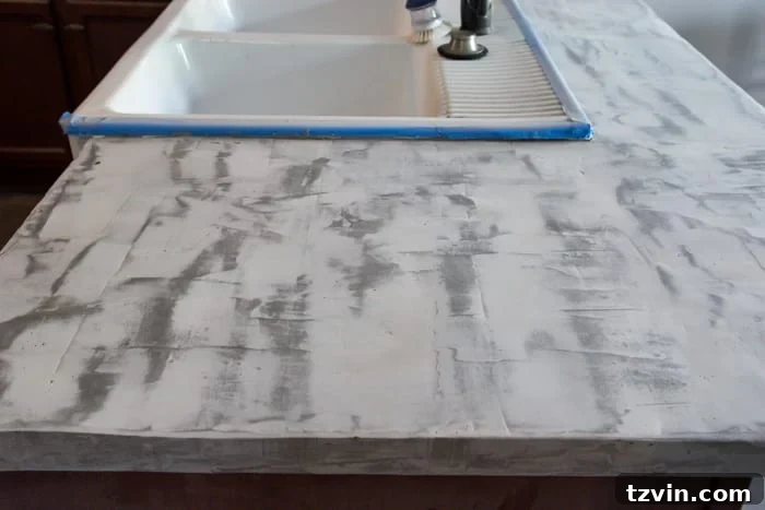 Transform Your Kitchen: DIY Concrete Countertops Over Laminate 10 DIY Feather Finish Concrete Countertops and How to Avoid a Huge Mistake | blesserhouse.com - A thorough step-by-step tutorial with useful tips and advice on what not to do.