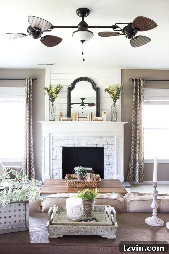 Elevate Your TV Area Style 4 Styling a TV-free fireplace mantel with a thrifted scroll mirror