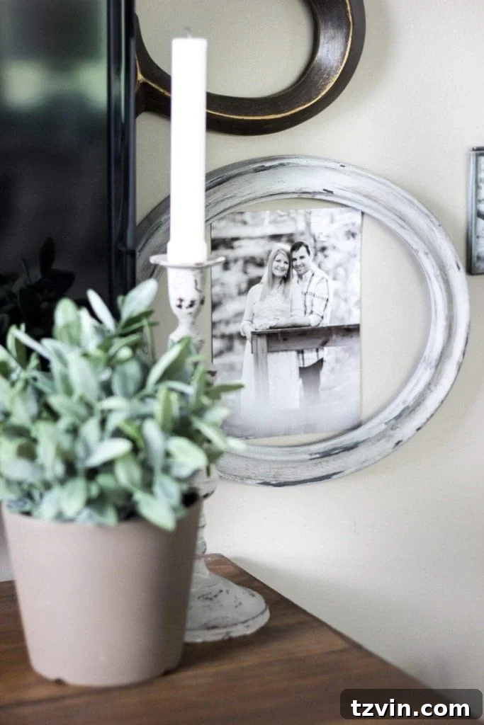 Elevate Your TV Area Style 8 Close-up of a gallery wall featuring framed sheet music and photos