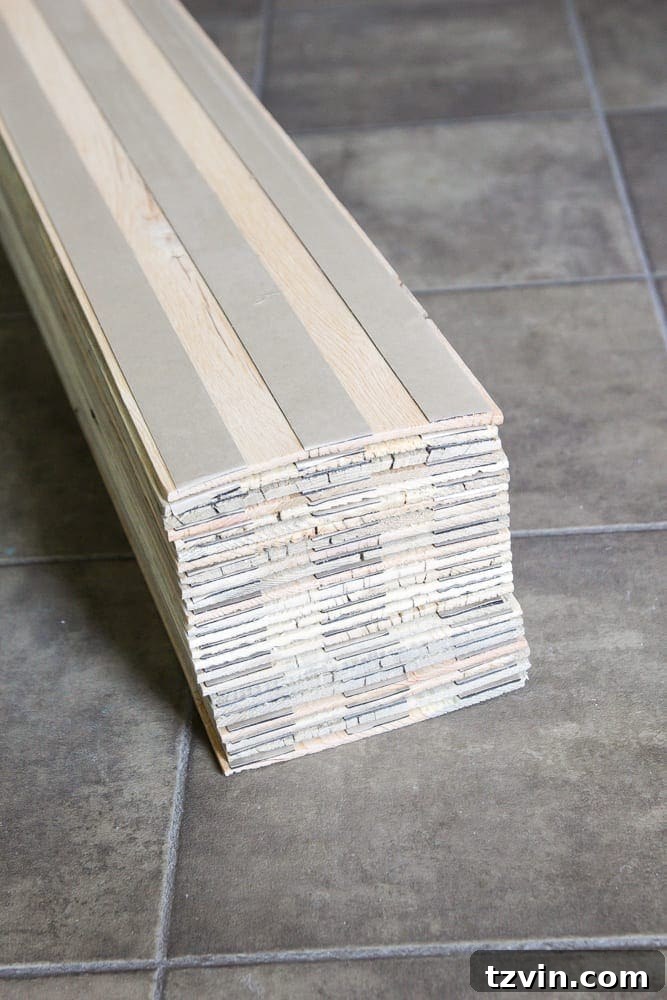 Stikwood reclaimed weathered wood planks neatly packaged for DIY installation.