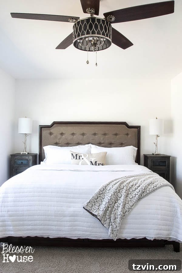 Get the Look: Our Rustic Modern Master Bedroom Transformation 2 Before: A plain white, boring builder-grade master bedroom awaiting a rustic modern makeover.