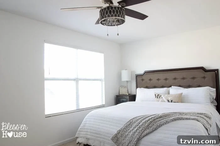 Get the Look: Our Rustic Modern Master Bedroom Transformation 11 Before: Plain windows in the master bedroom, lacking character and visual appeal.