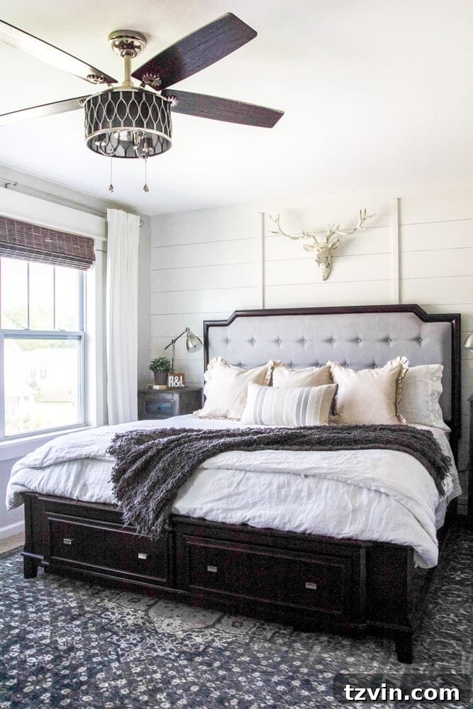 Get the Look: Our Rustic Modern Master Bedroom Transformation 12 DIY planked board and batten accent wall adding character to the rustic modern master bedroom.