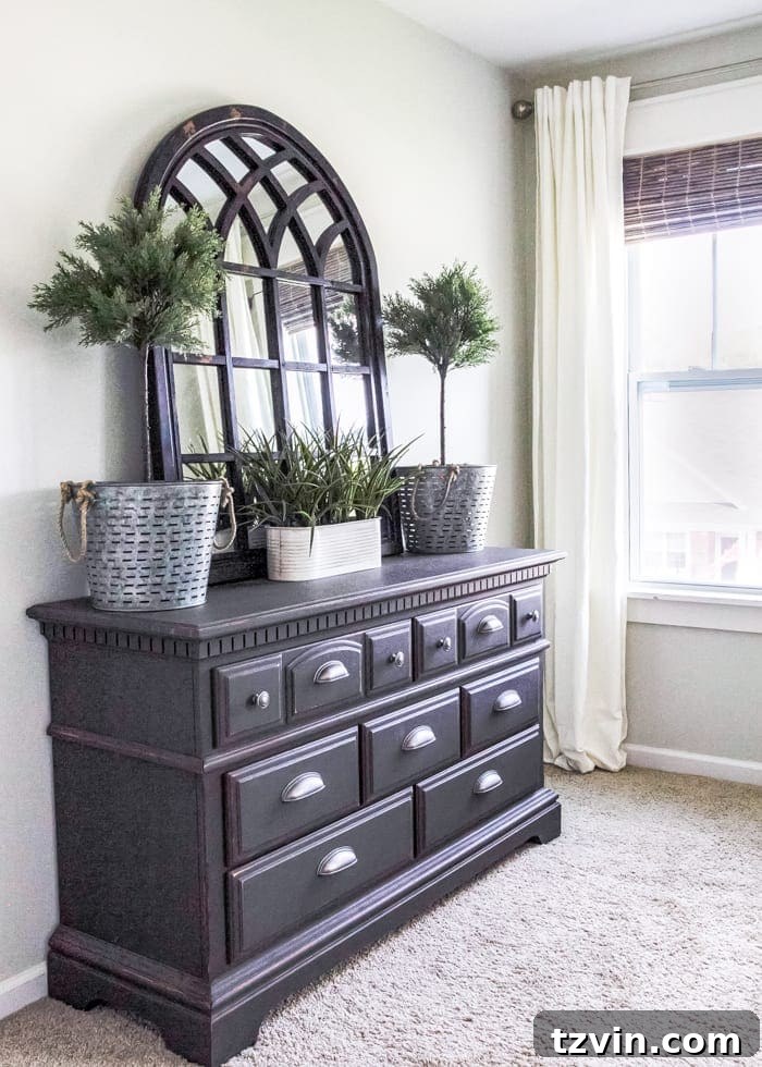 Get the Look: Our Rustic Modern Master Bedroom Transformation 16 Neutral light gray walls painted with Benjamin Moore Moonshine in the rustic modern master bedroom.