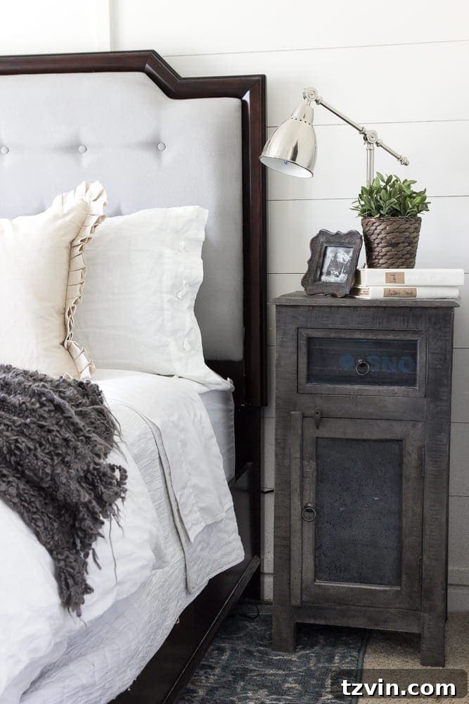 Get the Look: Our Rustic Modern Master Bedroom Transformation 5 Close-up of rustic modern nightstands complementing a painted upholstered bed and neutral bedding.