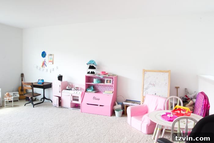 Playroom Storage and Media Wall Plans | blesserhouse.com - Design sketch showing built-ins and TV placement on a long wall.