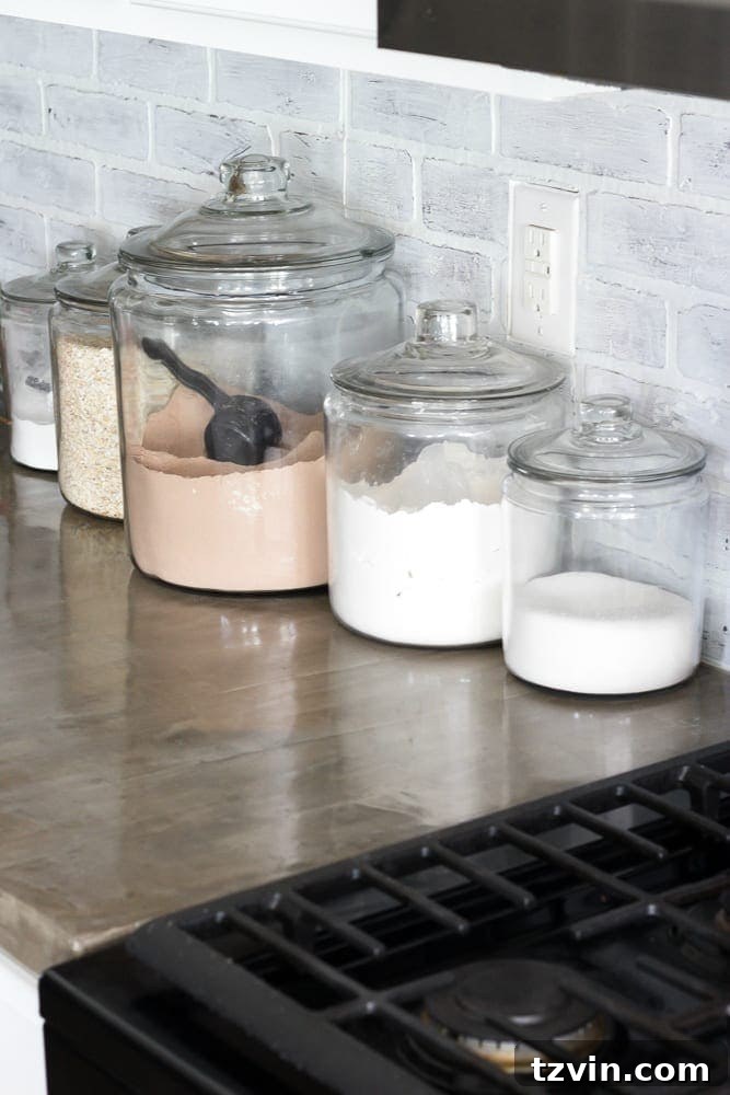 Grease stains on concrete countertop next to stove