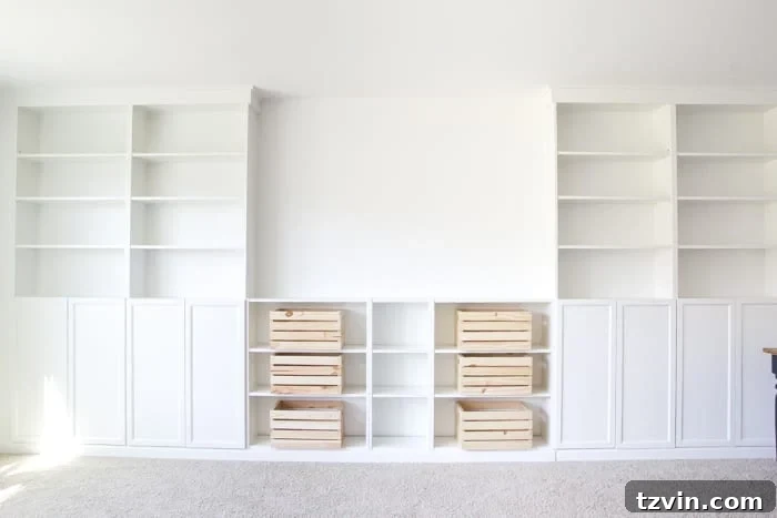 Finished DIY built-ins using IKEA Billy bookcases and Oxberg doors, showcasing the professional and integrated look.