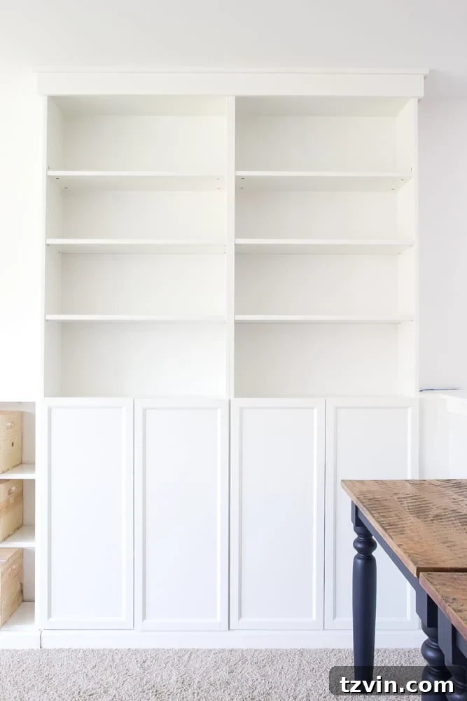 Detailed view of DIY Built-Ins from IKEA Billy Bookcases, providing professional-looking vertical storage and organization.